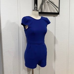 Beautiful BEBE romper in royal blue